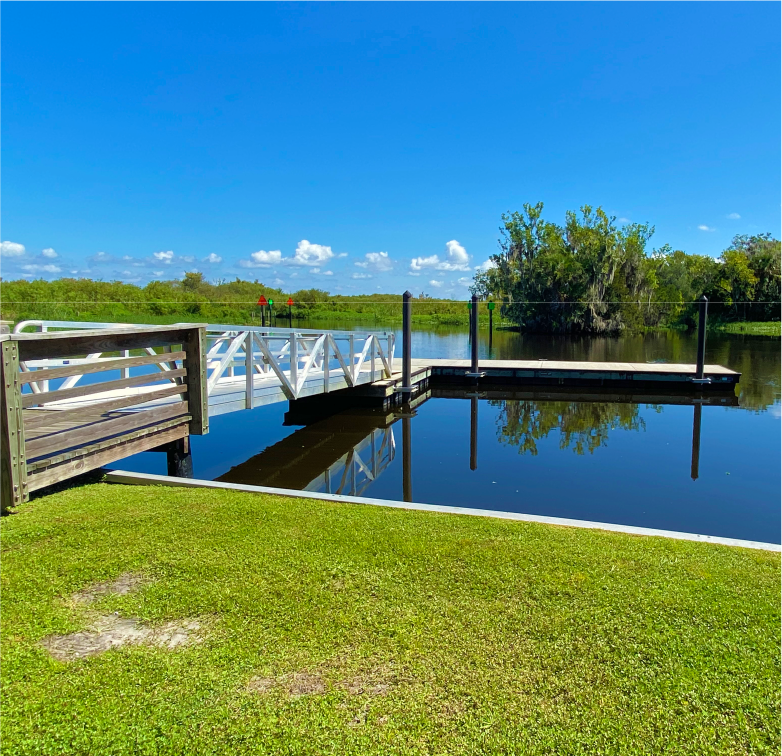 Picture of a floating dock on a tranquil waterway