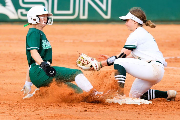Echo Photo Exhibition - Girl tagging out sliding runner in baseball game